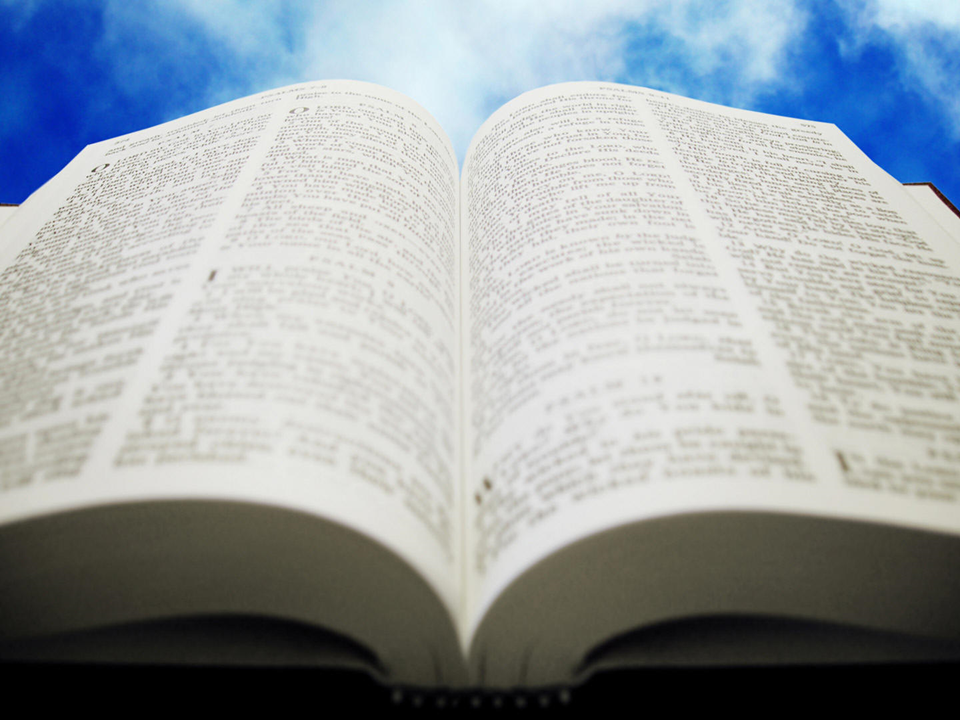 A book open to the word of god.